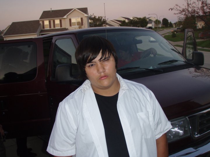 This is me before my freshman Homecoming. I was fed up with all the pix, so that's my explanation for the face.